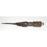 An early Tibetan carved wooden Phurba dagger. The handle being profusely carved with figures and