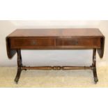 Mahogany sofa table with brass claw feet. 54 x 154 x 45cm