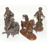 Four figures - A pair of cherubs, a seated writer and a mounted female warrior being attacked by a