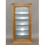 Table top display case with 5 glass shelves. 77cm tall