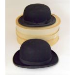 Two bowler hats. One Scott & Co and one Dunn & Co. Internal measurement 58cm. Approx 6 7/8