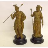 A pair of gilt metal classical figures each 36cm high