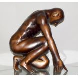 Bronzed figure of an athlete. 40cm tall
