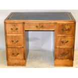 Oak leather topped desk with brass handles. 77 x 107 x 60cm