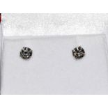 A Pair Of 14Ct white gold Diamond Stud Earrings Of 60 Points