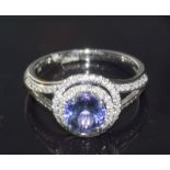 An 18Ct white gold Tanzanite And Diamond Halo Style Ring Of 1.6CtS