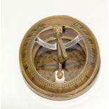 A Brass Cased Compass And Sundial