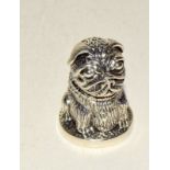 Heavy cast silver thimble in the form of a pug dog