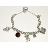 Silver charm bracelet and 5 charms weight 40gm