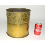 A huge WW1 trench art planter decorated with foliage and made from a 1917 dated German shell case.