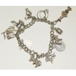 Silver charm bracelet and 12 charms weight 45gm
