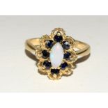9ct gold ladies Opal and garnet daisy ring size O