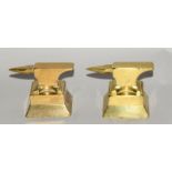 Two brass anvil paperweight