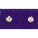 Pair of white gold diamond stud earrings