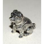 Heavy cast silver figure of a dog