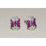 Pair of white gold ruby and diamond earrings