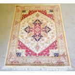 Beige ground Heriz rug. 190 x 140cm