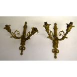 Two ornate brass wall lights