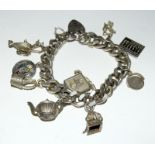 Silver charm bracelet together with 9 charms 83g