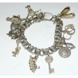 Silver charm bracelet together with 11 charms 53g