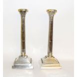 Pair of large silver plated candlesticks. 49cm tall