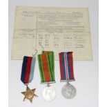 A WW2 Royal Navy Certificate of Service named to Thomas Frederick Edwards with his service medals
