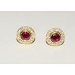 Pair of 18ct yellow gold ruby and diamond cluster earrings of approx 1.5ct