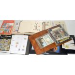 Large collection of stamps in 4 Albums plus Stanley Gibbons catalogues, etc