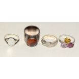 4 good size silver fashion rings