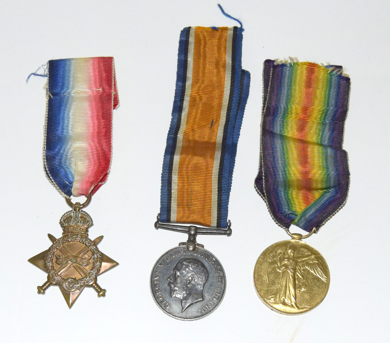 A WW1 medal trio named to 27533 Gunner HT Flack of the Royal Garrison Artillery