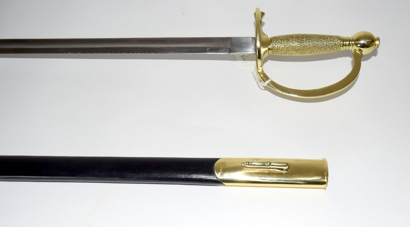 A single edged sword with gilt hilt and knuckle guard in its scabbard with brass mounts. Blade - Image 4 of 5