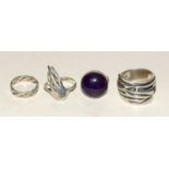 4 good size silver fashion rings