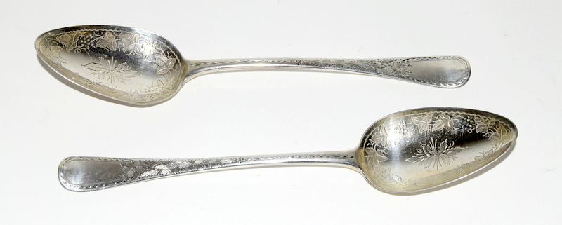 Pair of embossed serving spoons