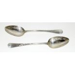Pair of embossed serving spoons