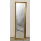 Gilt framed dressing mirror. 135 x 40cm