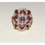 14ct yellow gold ruby and diamond cluster ring. Size O
