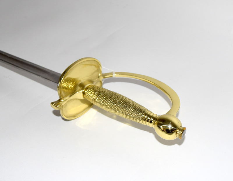 A single edged sword with gilt hilt and knuckle guard in its scabbard with brass mounts. Blade - Image 5 of 5