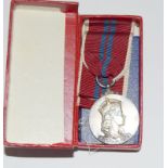 A silver 1953 Queen Elizabeth II Coronation Medal in its original box