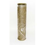 A WW1 trench art shell case vase decorated with foliage and the Moroccan towns of Fes' Rabat &