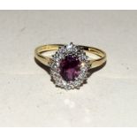 14ct yellow gold ruby and diamond cluster ring of approx 2ct. Size T