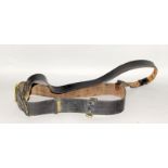 A black leather Sam Browne belt & cross strap