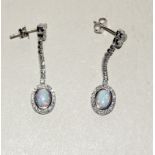 Pair of silver CZ and opal set drop earrings