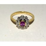 18ct yellow gold ruby and diamond cluster ring. Approx 1ct. Size O