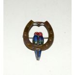 Vintage silver and enamel brooch, two love birds on a lucky horse shoe.