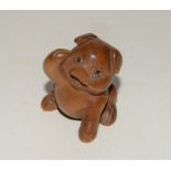 Japanese wooden netsuke in the form of a pig, signed to the base