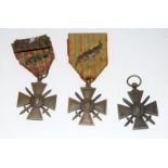 Three WW1 French Croix de Guerre medals. They are 1914-1915 a 1914-1917 with palm leaf and a 1914-