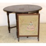 Oak drop leaf table (74 x 110 x 75cm) together with a hand embroidered fire screen.