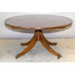 Oval mahogany coffee table supplied by Harrods