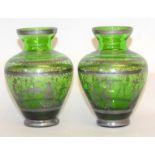 Pair of silver edged emerald green vases