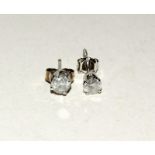 Pair of 14ct white gold diamond stud earrings of 40 points